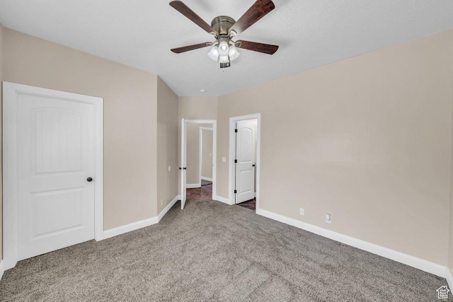 40 W Pecan Ln, Leeds, UT 84746 - unfurnished bedroom with carpet, baseboards, and ceiling fan