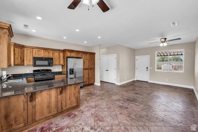 40 W Pecan Ln, Leeds, UT 84746 - kitchen featuring black appliances, ceiling fan, a sink, brown cabinetry, and a peninsula