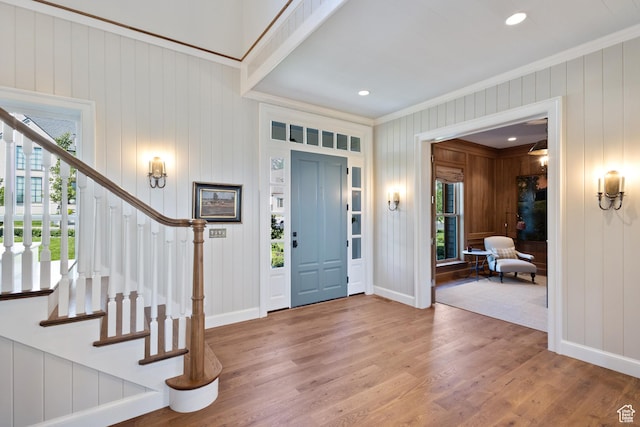 1449 Annie Cir N, Alpine, UT 84004 - foyer entrance featuring crown molding, wood finished floors, stairway, baseboards, and recessed lighting