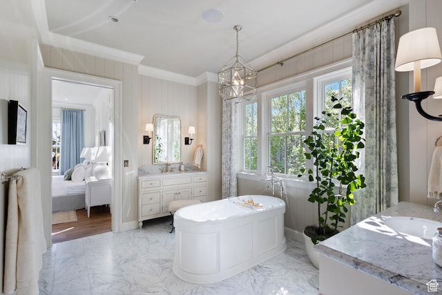 1449 Annie Cir N, Alpine, UT 84004 - ensuite bathroom featuring ornamental molding, vanity, a freestanding tub, marble finish floors, and a chandelier