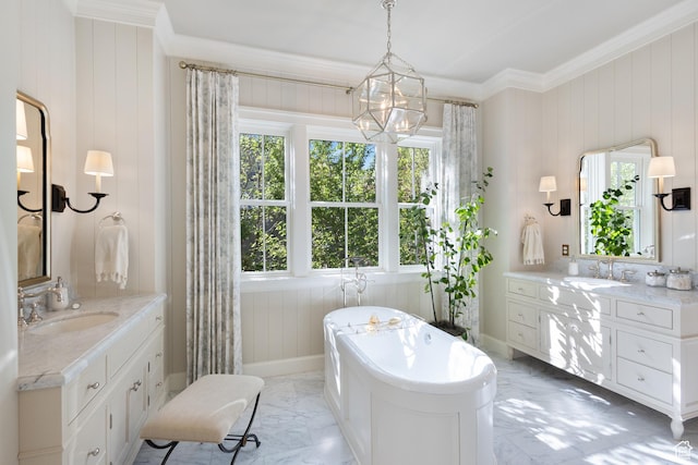 1449 Annie Cir N, Alpine, UT 84004 - bathroom featuring marble finish floors, crown molding, a freestanding tub, two vanities, and baseboards