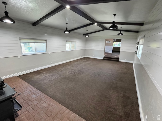 552 W 1200 N, Lehi, UT 84043 - unfurnished living room featuring wooden walls, baseboards, and a textured ceiling
