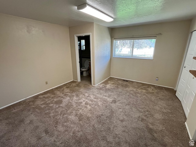 552 W 1200 N, Lehi, UT 84043 - unfurnished bedroom with carpet, baseboards, and a textured ceiling