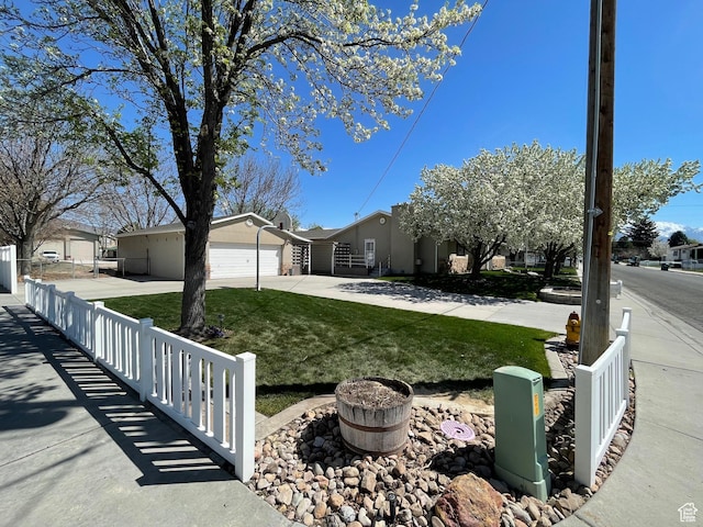 552 W 1200 N, Lehi, UT 84043 - view of front of property featuring concrete driveway, an attached garage, and stucco siding