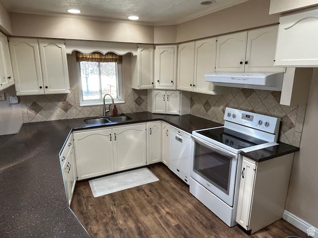 552 W 1200 N, Lehi, UT 84043 - kitchen featuring white appliances, under cabinet range hood, a sink, dark countertops, and crown molding