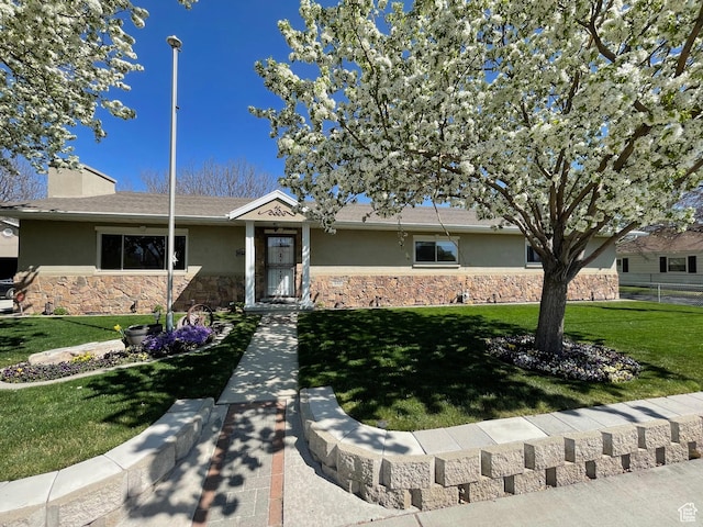 552 W 1200 N, Lehi, UT 84043 - ranch-style house featuring stucco siding, stone siding, a front yard, and a chimney