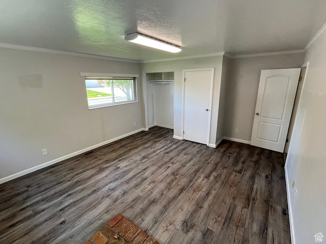 552 W 1200 N, Lehi, UT 84043 - unfurnished bedroom with dark wood-style floors, baseboards, crown molding, and a closet