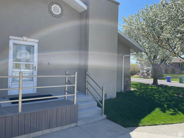 552 W 1200 N, Lehi, UT 84043 - property entrance with stucco siding and a yard