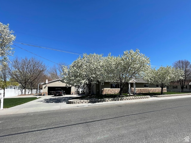 552 W 1200 N, Lehi, UT 84043 - view of property hidden behind natural elements featuring a garage and driveway