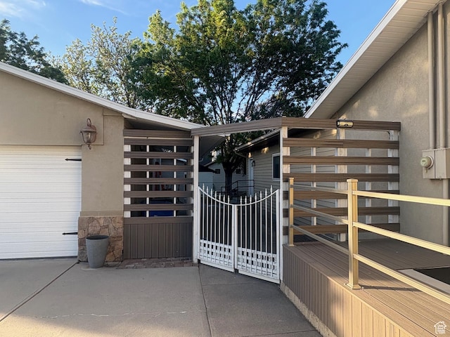 552 W 1200 N, Lehi, UT 84043 - doorway to property featuring a garage, stucco siding, stone siding, and driveway