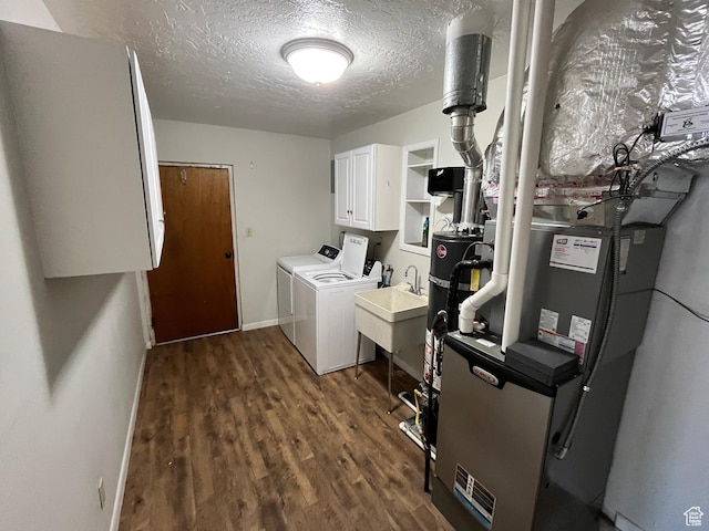 552 W 1200 N, Lehi, UT 84043 - washroom featuring washer and clothes dryer, cabinet space, dark wood-style floors, a textured ceiling, and baseboards