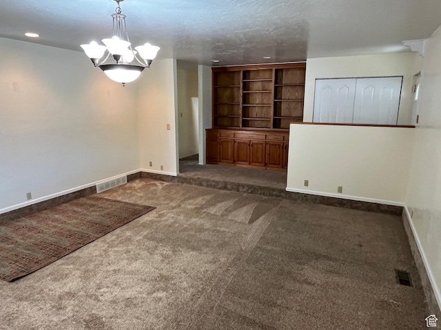 552 W 1200 N, Lehi, UT 84043 - spare room with dark carpet, a chandelier, and baseboards