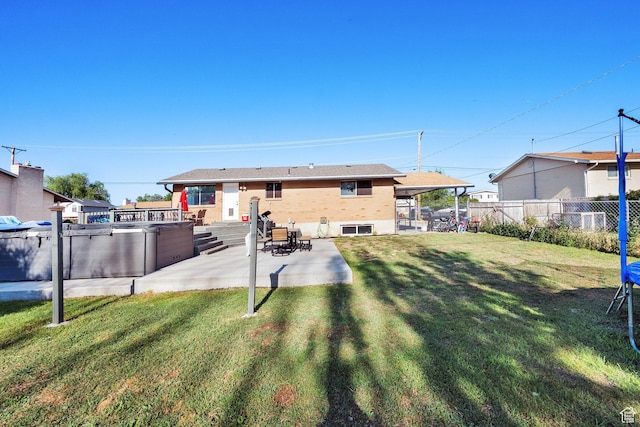 1657 N 1500 W, Clinton, UT 84015 - back of house featuring a patio area and a hot tub