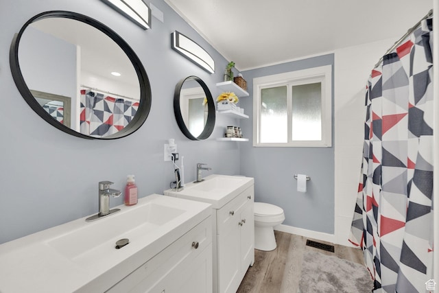 1657 N 1500 W, Clinton, UT 84015 - full bath featuring wood finished floors, vanity, toilet, and a shower with shower curtain