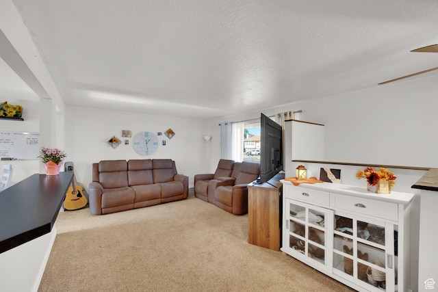 1657 N 1500 W, Clinton, UT 84015 - living room featuring carpet and a textured ceiling