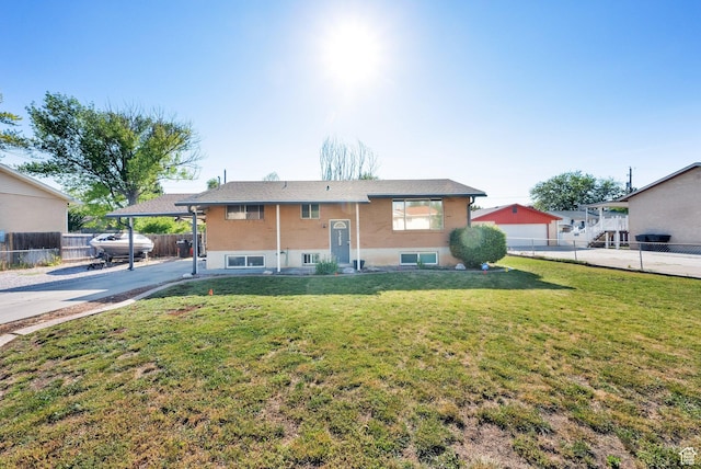 1657 N 1500 W, Clinton, UT 84015 - raised ranch featuring concrete driveway and a carport