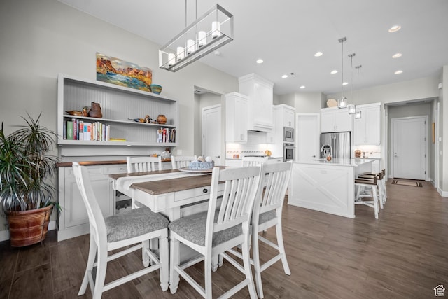 97 S 495 W, Ivins, UT 84738 - dining room featuring dark wood-style flooring and recessed lighting