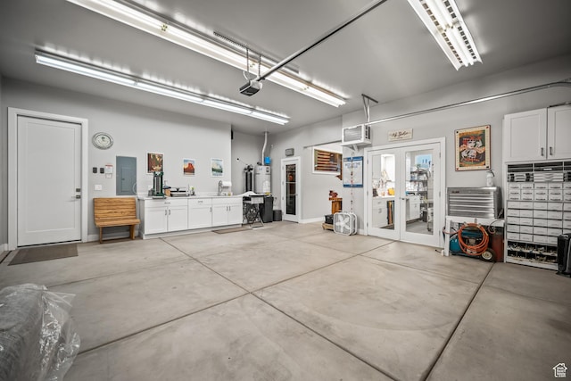 97 S 495 W, Ivins, UT 84738 - garage with electric panel, a garage door opener, and water heater