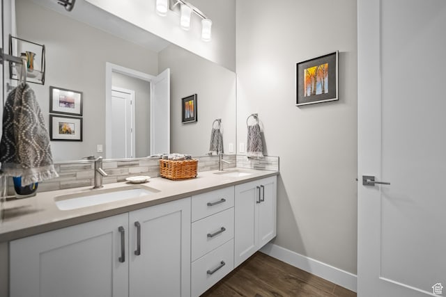 97 S 495 W, Ivins, UT 84738 - full bath featuring double vanity, wood finished floors, baseboards, and tasteful backsplash