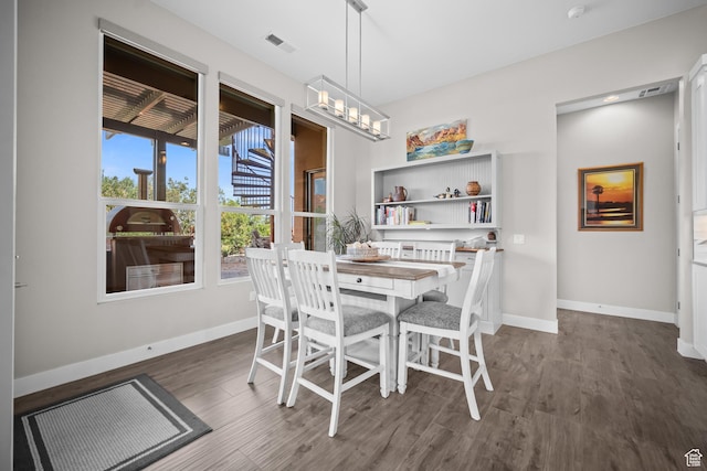 97 S 495 W, Ivins, UT 84738 - dining room with dark wood finished floors, baseboards, and a chandelier