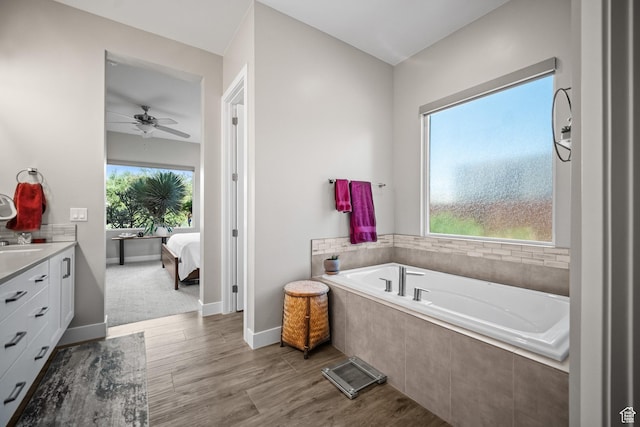 97 S 495 W, Ivins, UT 84738 - full bathroom with ensuite bath, a bath, vanity, ceiling fan, and wood finished floors