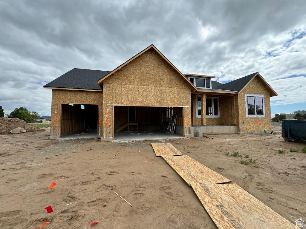 2607 W 550 N, West Point, UT 84015 - unfinished property featuring an attached garage and driveway