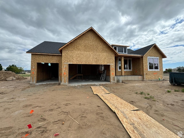 2607 W 550 N, West Point, UT 84015 - unfinished property featuring an attached garage and driveway
