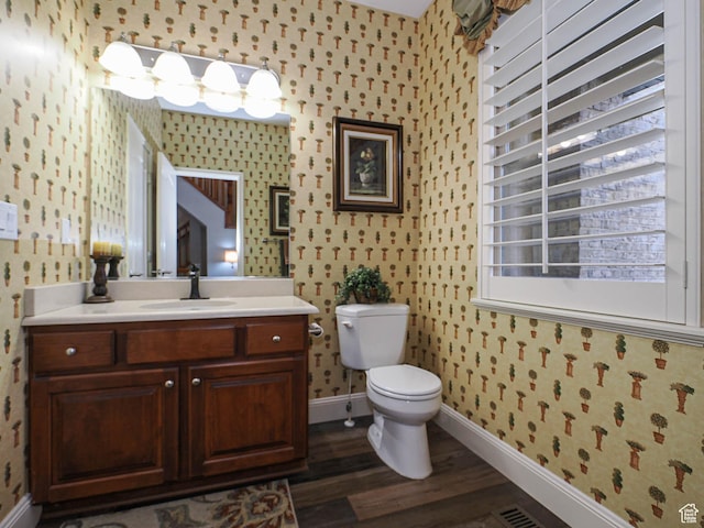 12687 S Verona Creek Way W, Riverton, UT 84065 - bathroom with wallpapered walls, baseboards, toilet, wood finished floors, and vanity