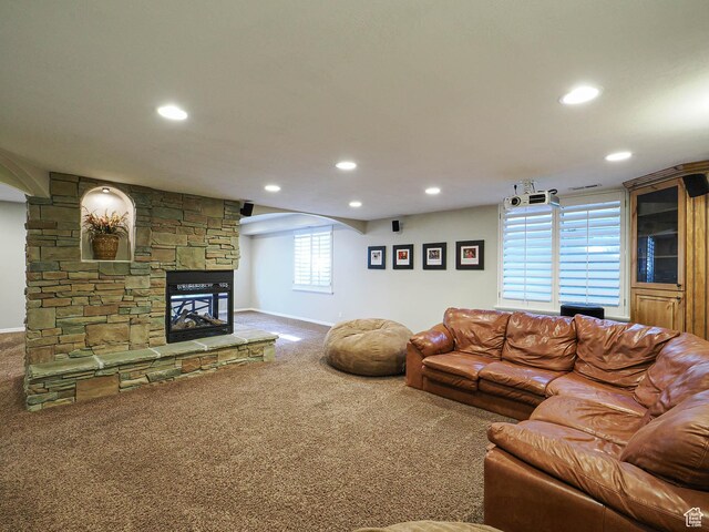 12687 S Verona Creek Way W, Riverton, UT 84065 - carpeted living room with recessed lighting, a stone fireplace, and baseboards