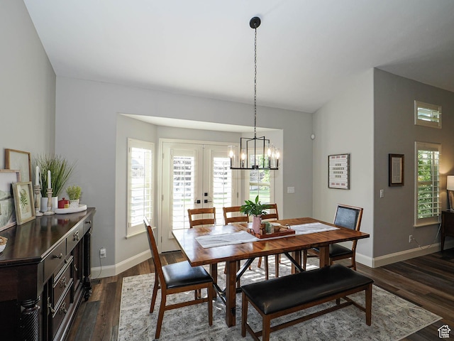 12687 S Verona Creek Way W, Riverton, UT 84065 - dining area with a chandelier, baseboards, and dark wood-type flooring