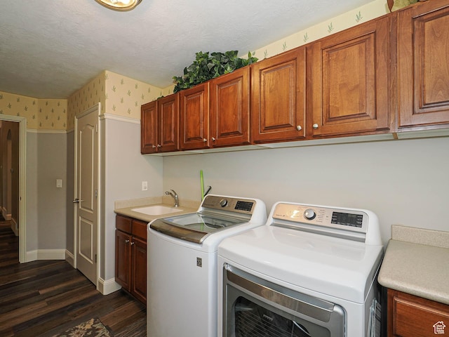 12687 S Verona Creek Way W, Riverton, UT 84065 - laundry room featuring wallpapered walls, cabinet space, separate washer and dryer, dark wood-style floors, and baseboards
