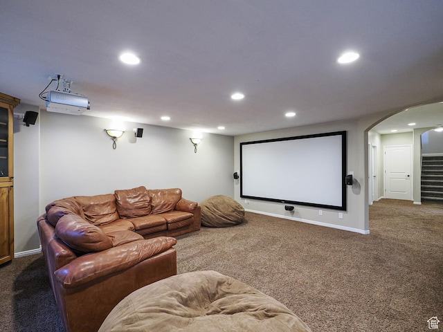 12687 S Verona Creek Way W, Riverton, UT 84065 - carpeted home theater with arched walkways, recessed lighting, and baseboards