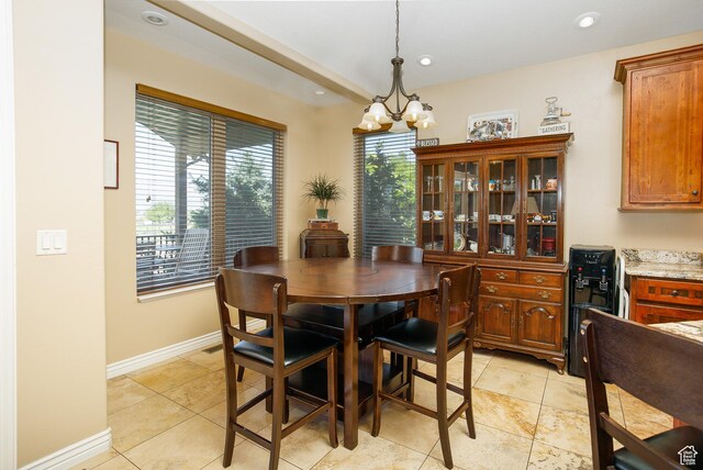 2073 S Allen Rd, Taylor, UT 84401 - dining space with a chandelier, recessed lighting, light tile patterned flooring, and baseboards