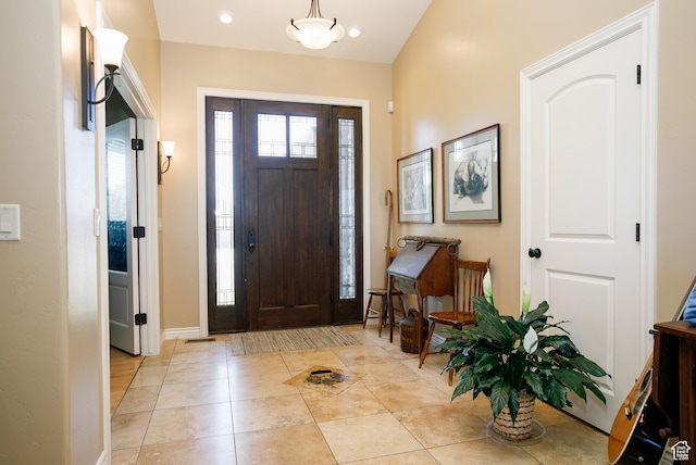 2073 S Allen Rd, Taylor, UT 84401 - foyer entrance featuring baseboards and light tile patterned flooring