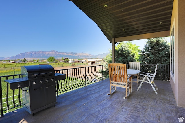 2073 S Allen Rd, Taylor, UT 84401 - deck featuring a mountain view, area for grilling, and a view of countryside