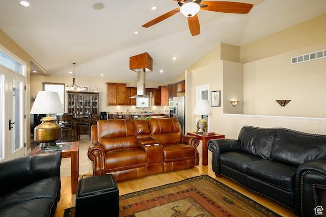 2073 S Allen Rd, Taylor, UT 84401 - living room with a ceiling fan, lofted ceiling, recessed lighting, and light wood finished floors
