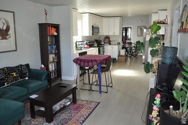 331 E Hampton Ave S, Salt Lake City, UT 84111 - living room with light wood finished floors