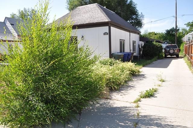 331 E Hampton Ave S, Salt Lake City, UT 84111 - view of side of home featuring driveway and board and batten siding