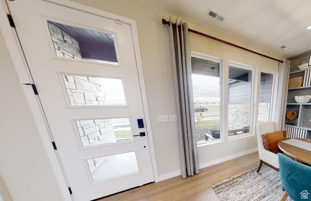3551 S 2410 W Unit 315, Syracuse, UT 84075 - foyer featuring light wood-style floors and baseboards