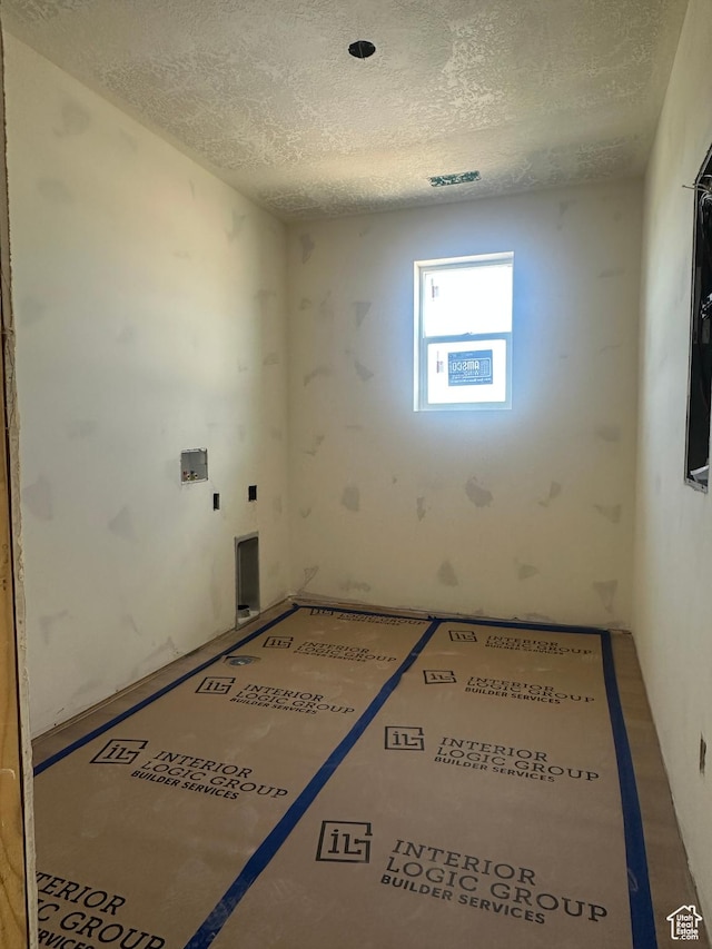 3551 S 2410 W Unit 315, Syracuse, UT 84075 - empty room with a textured ceiling
