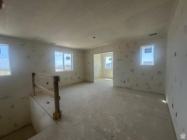 3551 S 2410 W Unit 315, Syracuse, UT 84075 - empty room featuring a textured ceiling