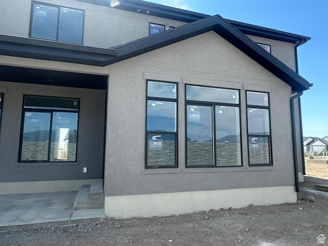 3551 S 2410 W Unit 315, Syracuse, UT 84075 - view of property exterior with stucco siding