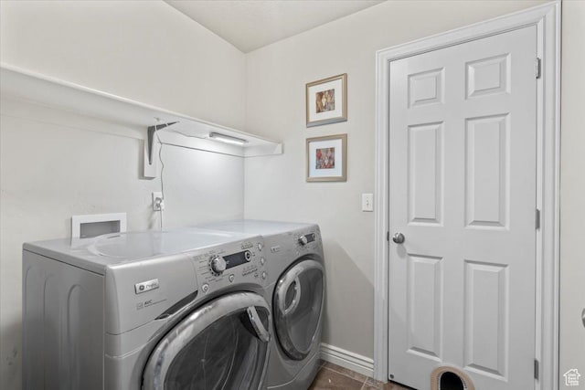 1853 W 2300 S, Woods Cross, UT 84087 - washroom with washer and dryer, baseboards, and dark tile patterned flooring