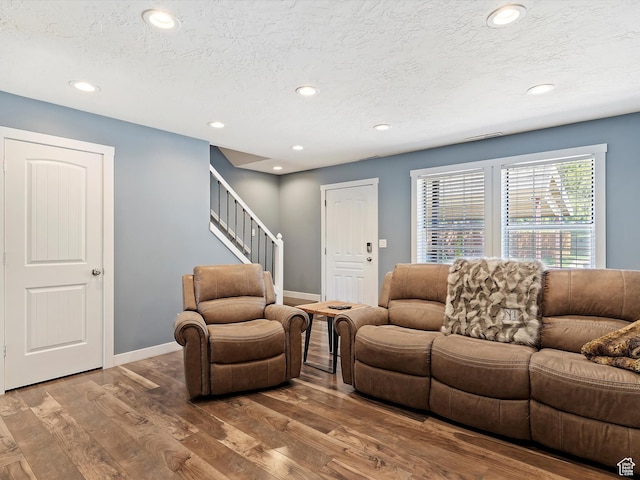 1631 E 1470 S Unit 5E, Ogden, UT 84404 - living room featuring wood finished floors, recessed lighting, a textured ceiling, baseboards, and stairs