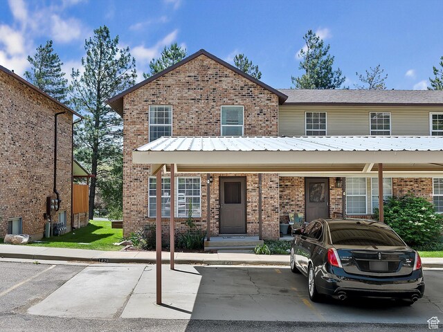 1631 E 1470 S Unit 5E, Ogden, UT 84404 - multi unit property with brick siding and uncovered parking