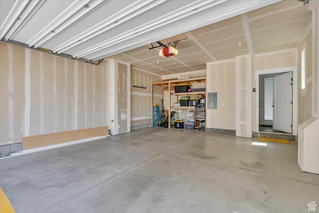 6202 W Birch Run Rd, South Jordan, UT 84009 - garage featuring a garage door opener and electric panel
