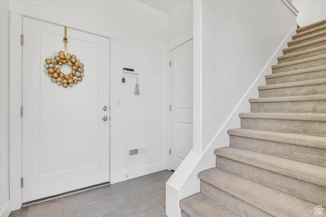 6202 W Birch Run Rd, South Jordan, UT 84009 - tiled foyer entrance with stairway and baseboards