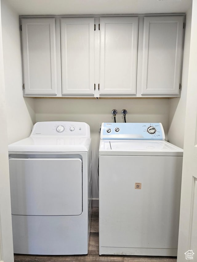 82 S Santa Rita Pl, West Jordan, UT 84088 - laundry area with washing machine and dryer, cabinet space, and wood finished floors