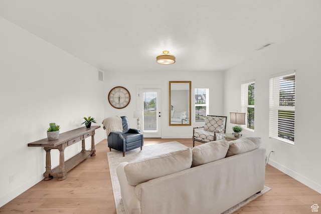 10777 S Lamond Dr W, South Jordan, UT 84009 - living room with light wood-type flooring and baseboards