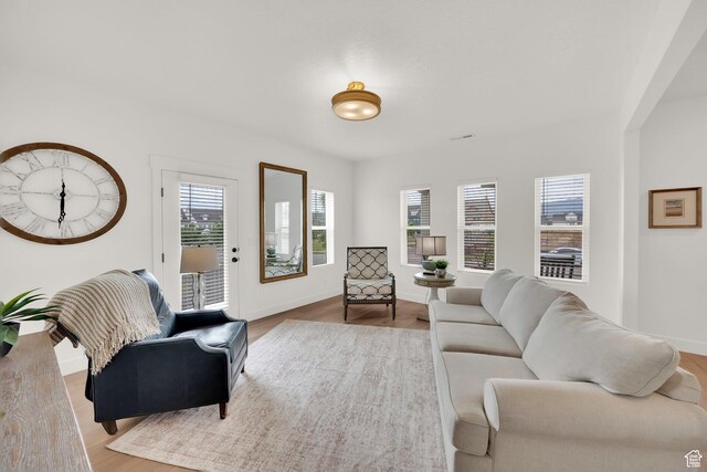 10777 S Lamond Dr W, South Jordan, UT 84009 - living room with light wood-type flooring and baseboards